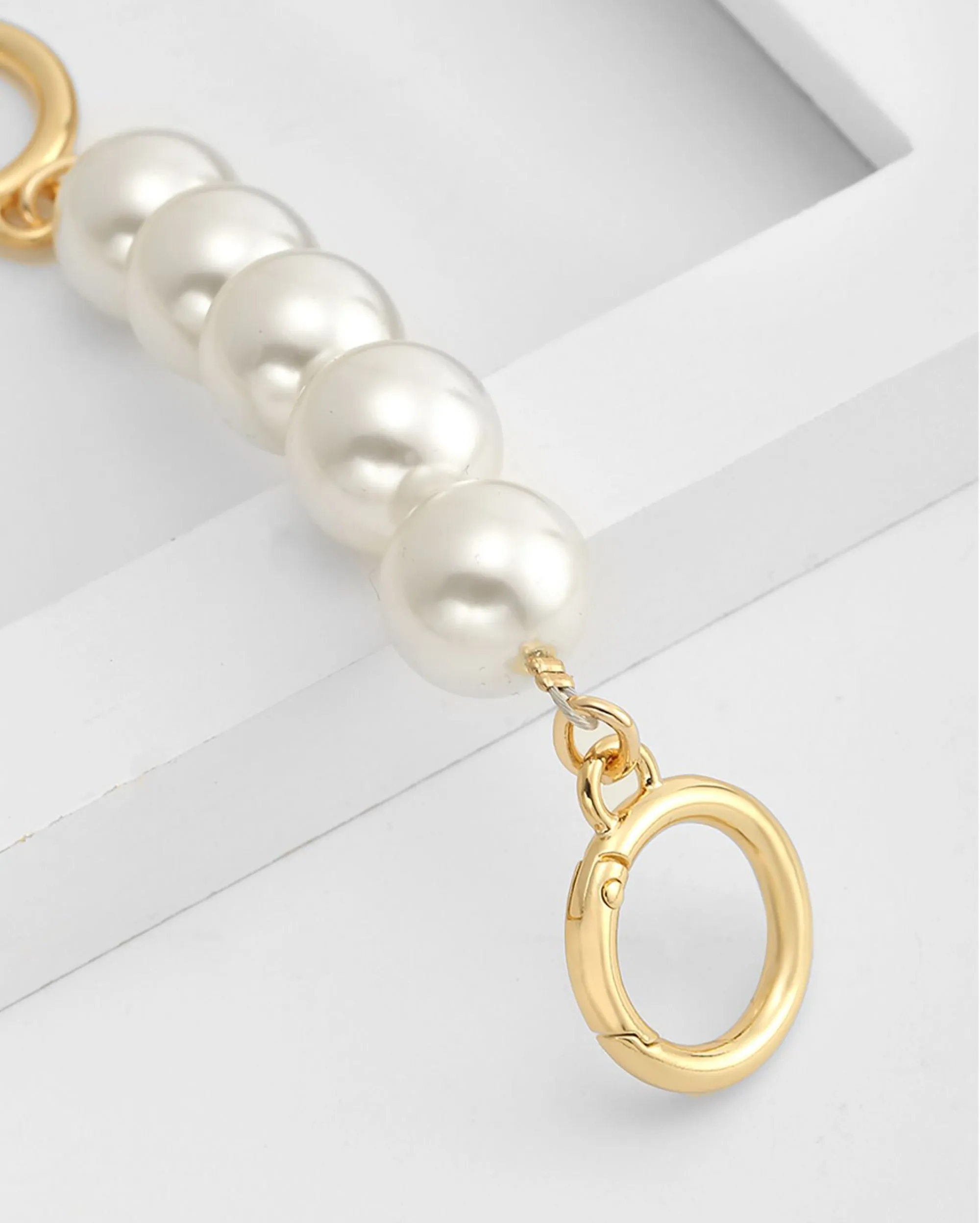 Underarm bag strap extension accessory, pearl extension chain, metal chain strap modification for bags.