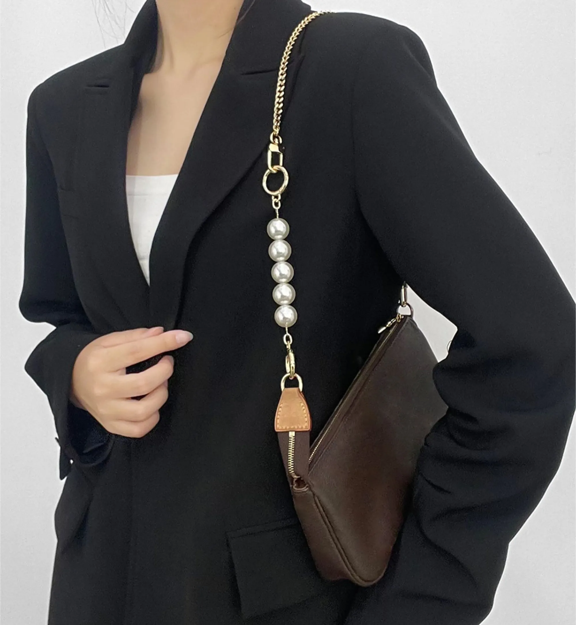 Underarm bag strap extension accessory, pearl extension chain, metal chain strap modification for bags.